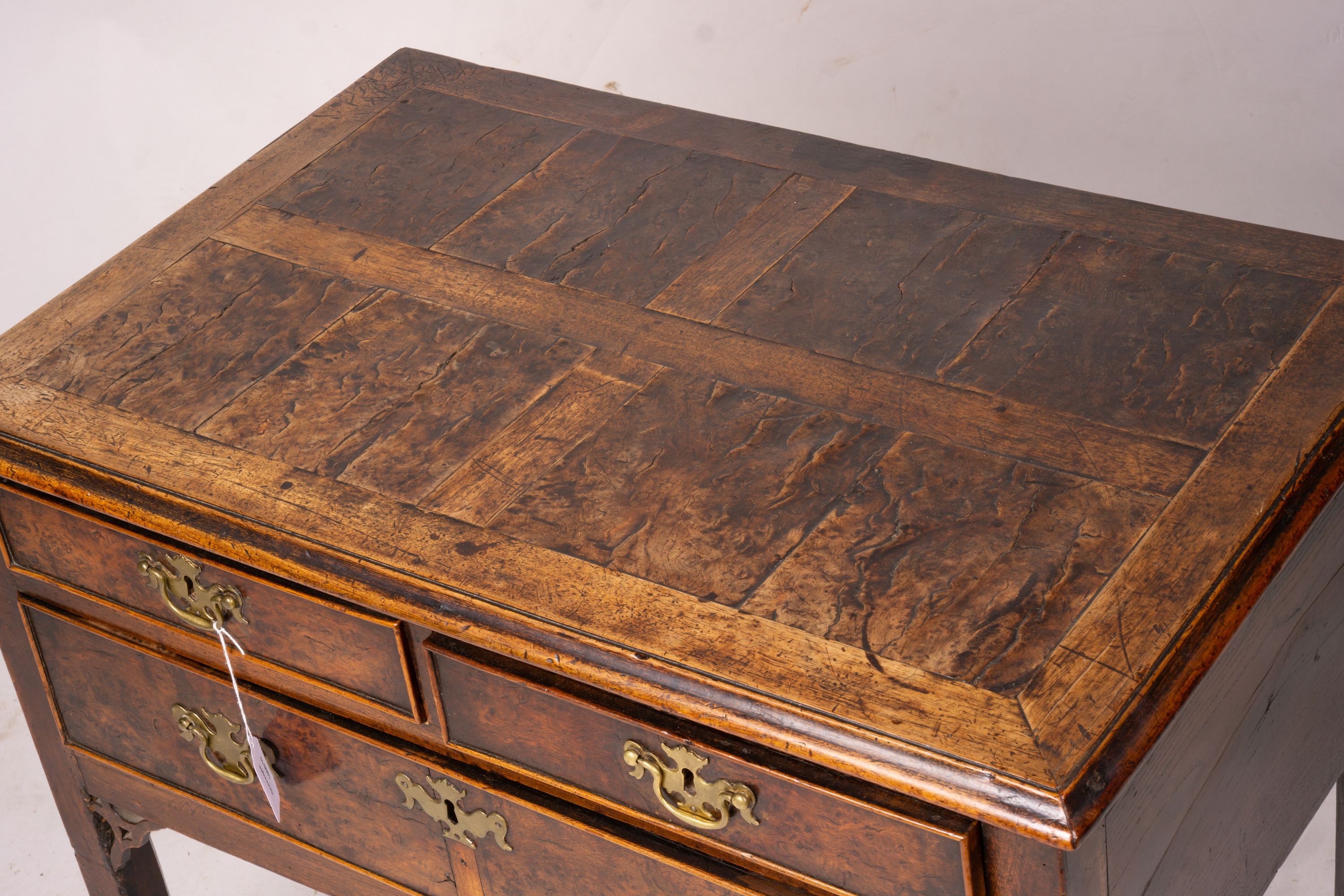 A George III oak and pollard oak three drawer side table, width 83cm, depth 51cm, height 72cm